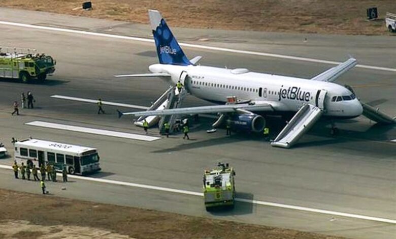 Jetblue flight makes rapid emergency landing in kansas over smoke alert in intense few minutes that left travelers in tears