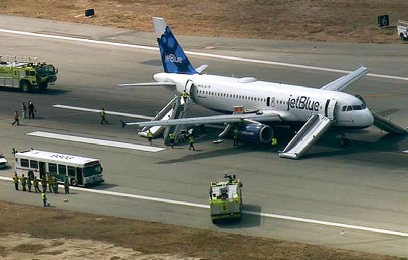 Jetblue flight makes rapid emergency landing in kansas over smoke alert in intense few minutes that left travelers in tears