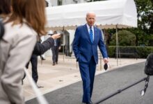 Biden seeks elusive low profile as a turbulent summer winds to a close