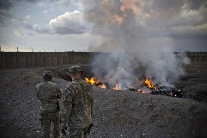 What are burn pits and how did they harm u s troops