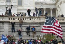 Politico demands josh hawley stop using infamous 1 6 photo on his campaign merchandise