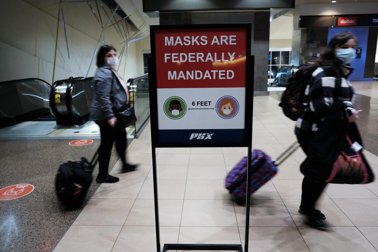Federal judge strikes down mask mandate for planes and public transit