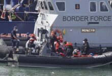 Picture shows rammed border force boat arrive in uk as 700 migrants pour in