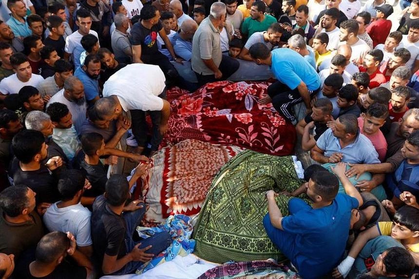 Thousands gather for funeral of israeli american hostage killed in gaza