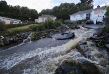 Uk weather flash floods leave cars underwater as some areas see more than a months rainfall