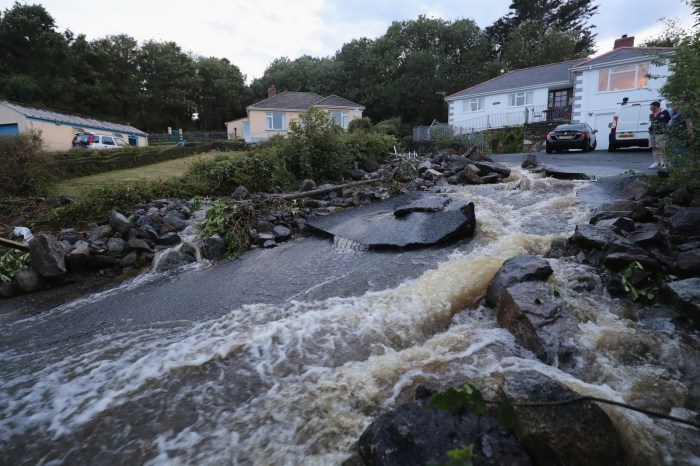 Uk weather flash floods leave cars underwater as some areas see more than a months rainfall