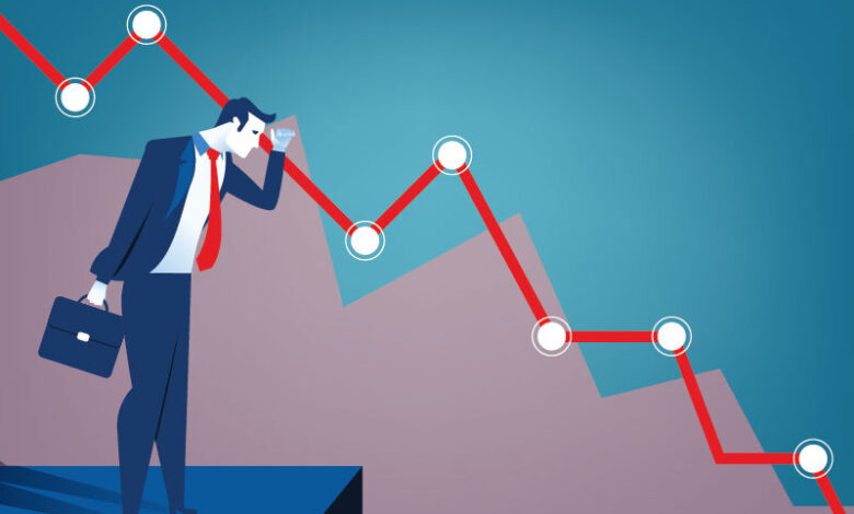 Wall street edges lower to end a bruising week