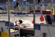 China erects so called covid cages in shanghai as new cases emerge